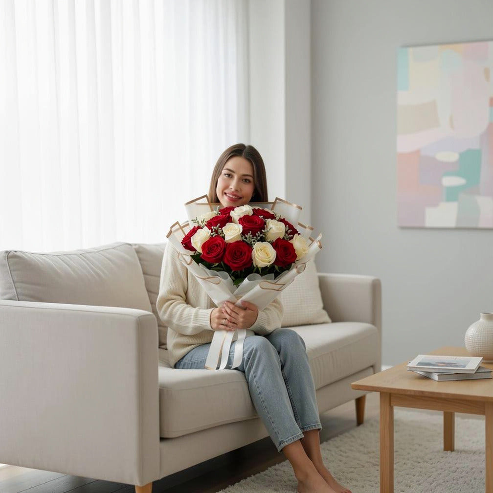 16 Red & White Rose Bouquet for Anniversary held by a model, view 3