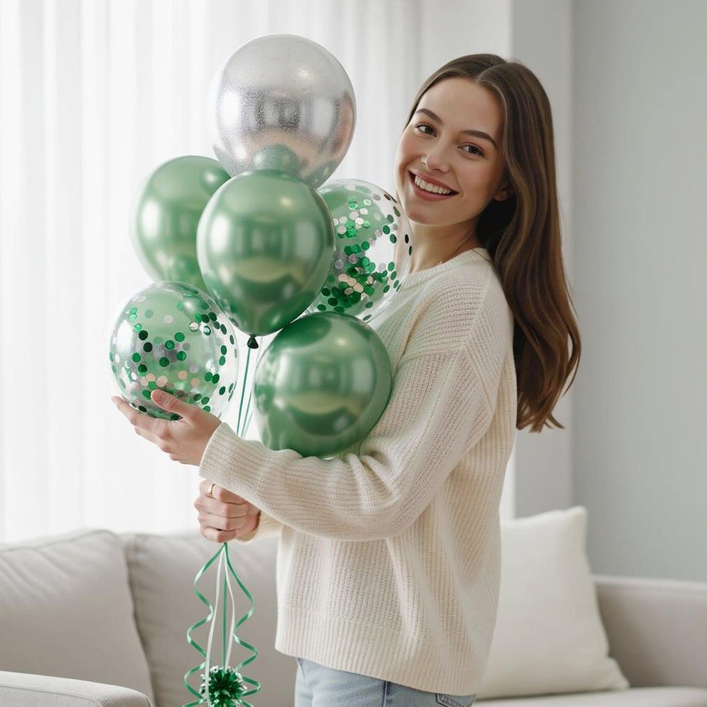4 Silver & Green Round Helium Foil Balloons with 2 Green Confetti Balloons held by a model, view 1