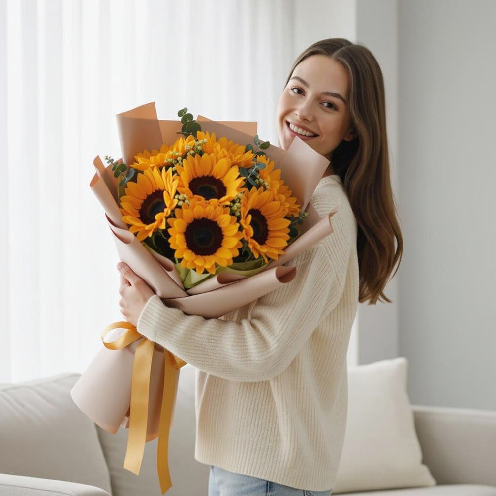 7 Sunflower Bouquet for Birthday held by a model, view 1
