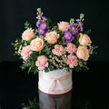 Elegant White Round Flower Box with Peach Roses, Pink Carnations & Purple Matthiola bloomsandbeansae