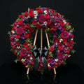 Standing Funeral Wreath with Red Roses, Purple Dahlias & Orchids with Black Ribbon Bow bloomsandbeansae