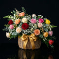 Vibrant Multicolor Rose Basket with Elegant Golden Ribbon bloomsandbeansae