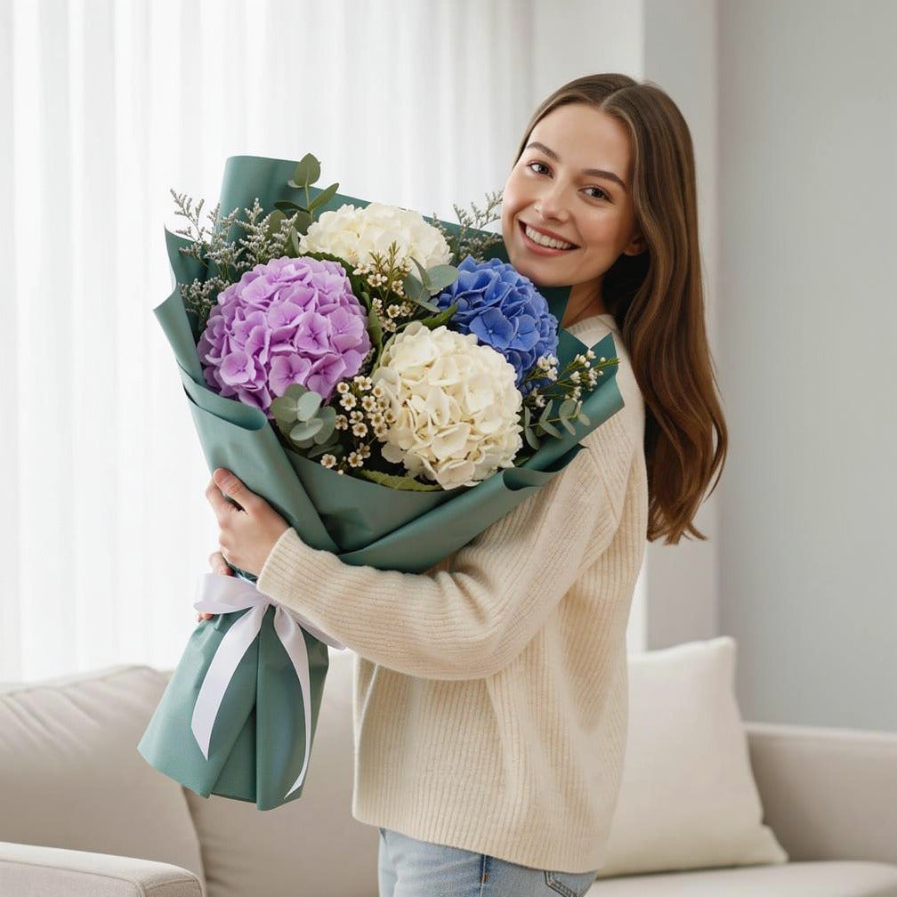 Adorable Mixed Hydrangea Bouquet held by a model, view 1