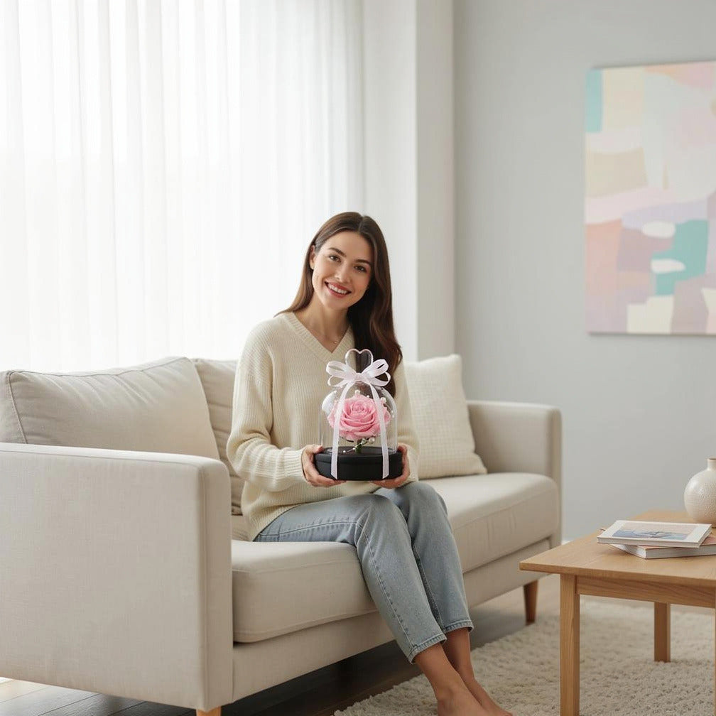 Baby Pink Small Preserved Rose held by a model, view 3
