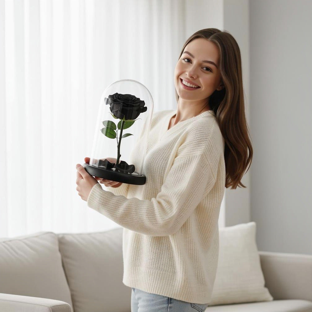 Black Medium Preserved Rose held by a model, view 1