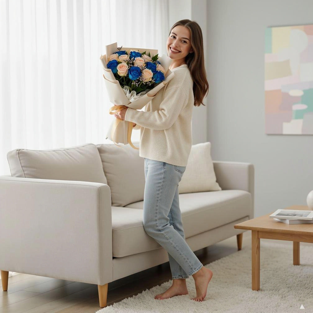 Blue & Peach Roses Graduation Bouquet held by a model, view 2