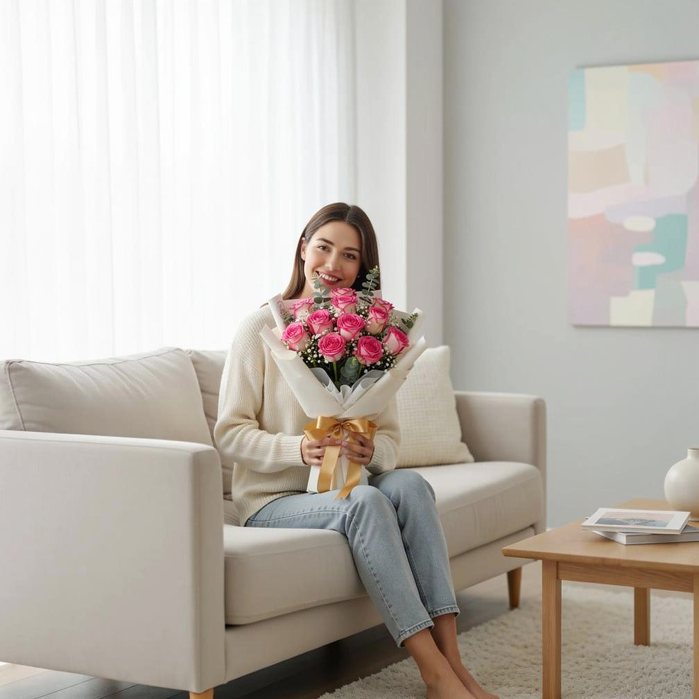 Blush Success Pink Roses Graduation Bouquet held by a model, view 3