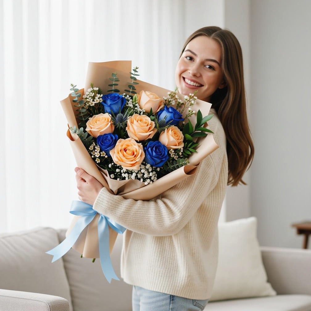 Bouquet of Peach & Blue Roses for Father’s Day held by a model, view 1