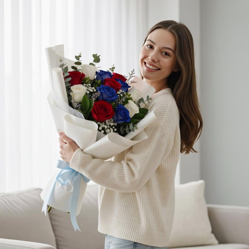 Bouquet of White, Red & Blue Roses for Father’s Day held by a model, view 1