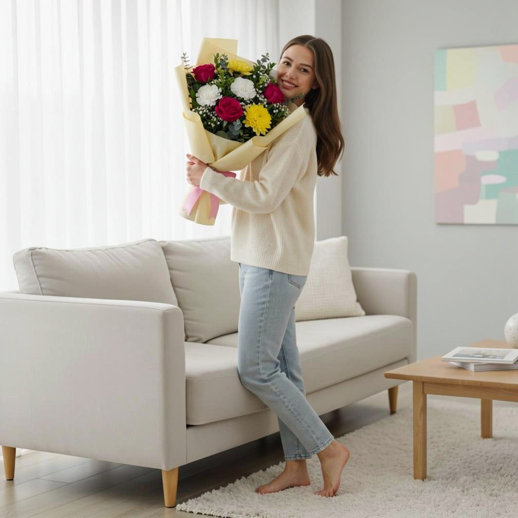 Charm Bouquet of Pink Roses & Yellow Chrysanthemum held by a model, view 2