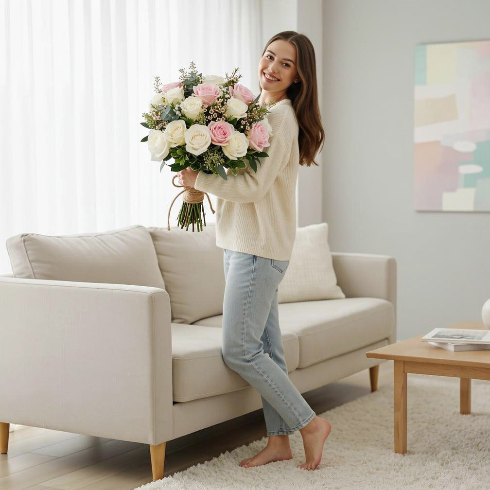 Delicate Bridal Bouquet of White & Pink Roses held by a model, view 2