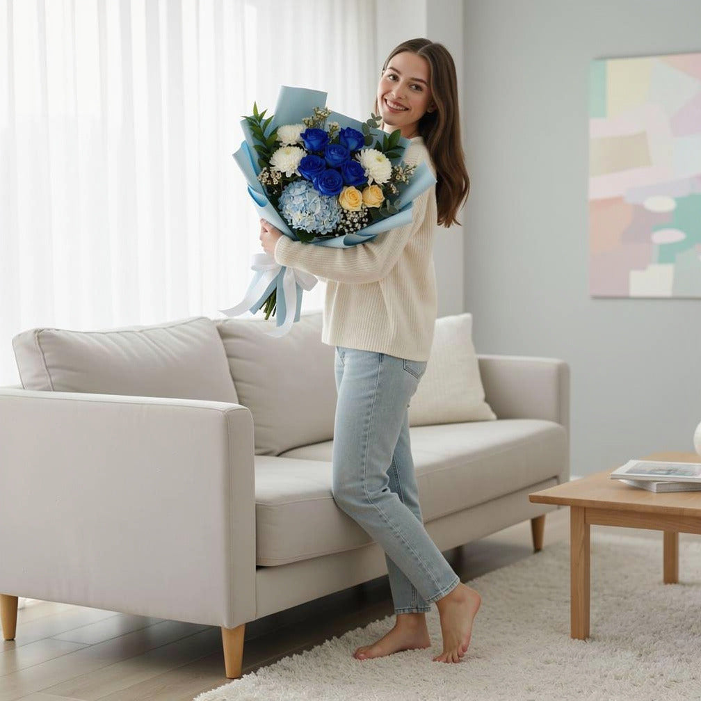 Eid Royal Bouquet of Blue, Yellow Roses & Hydrangea held by a model, view 2