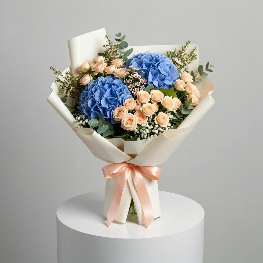 Elegant Blue Hydrangea & Peach Baby Rose Bouquet