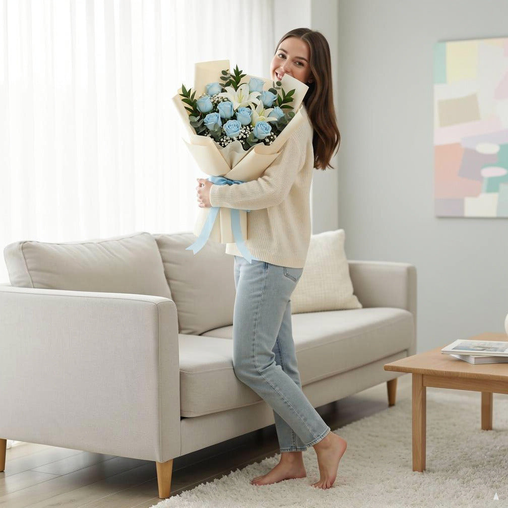 Elegant Bouquet of 10 Blue Roses & White Lilies for Father’s Day held by a model, view 2