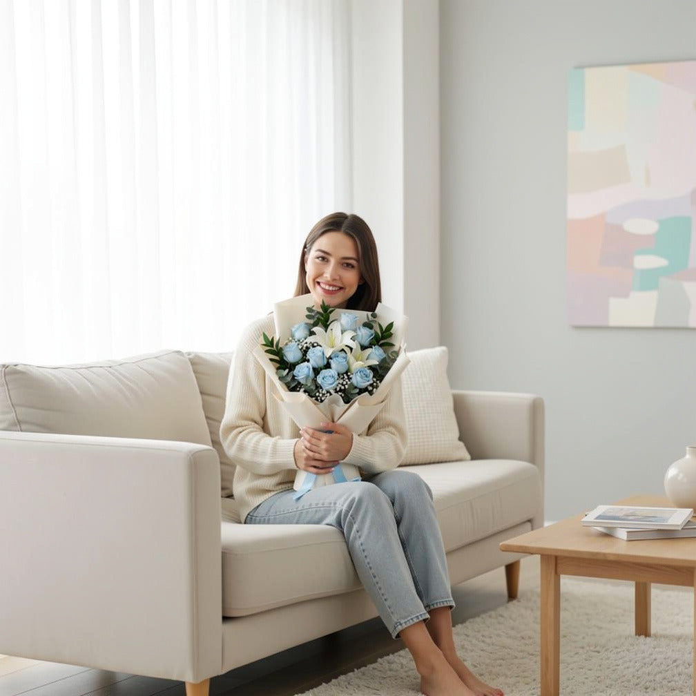 Elegant Bouquet of 10 Blue Roses & White Lilies for Father’s Day held by a model, view 3