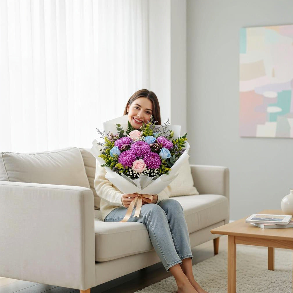 Elegant Bouquet of Pink & Blue Roses with Chrysanthemums for Father’s Day held by a model, view 3