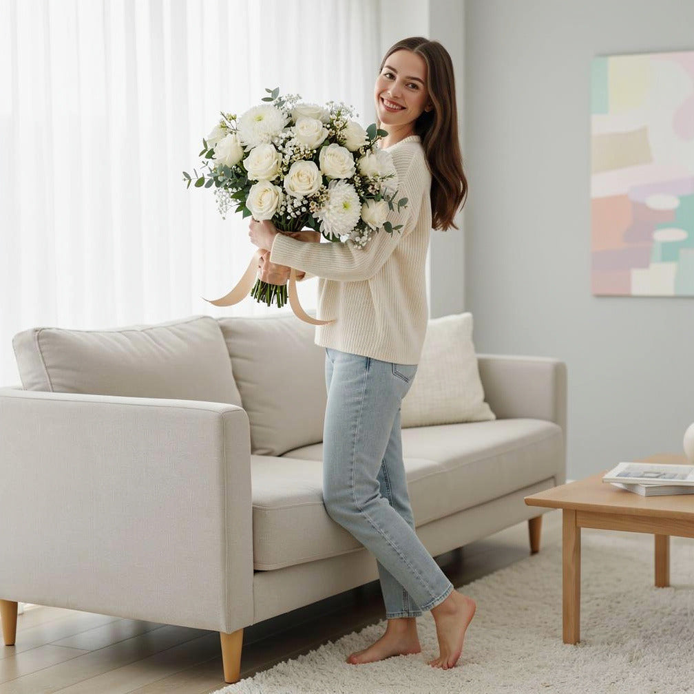 Elegant Bridal Bouquet of White Roses & Chrysanthemums held by a model, view 2
