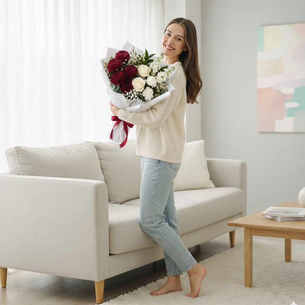 Elegant Red Chrysanthemum & White Flowers Bouquet held by a model, view 2