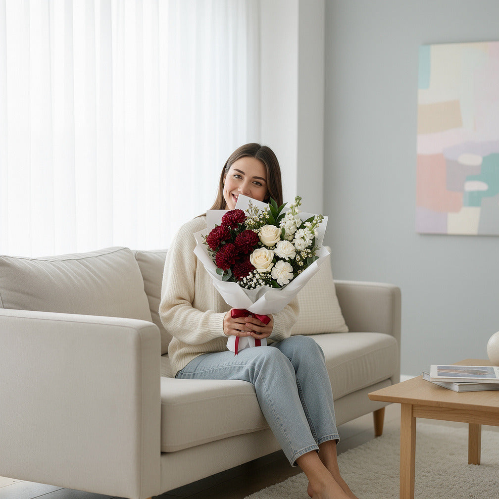 Elegant Red Chrysanthemum & White Flowers Bouquet held by a model, view 3