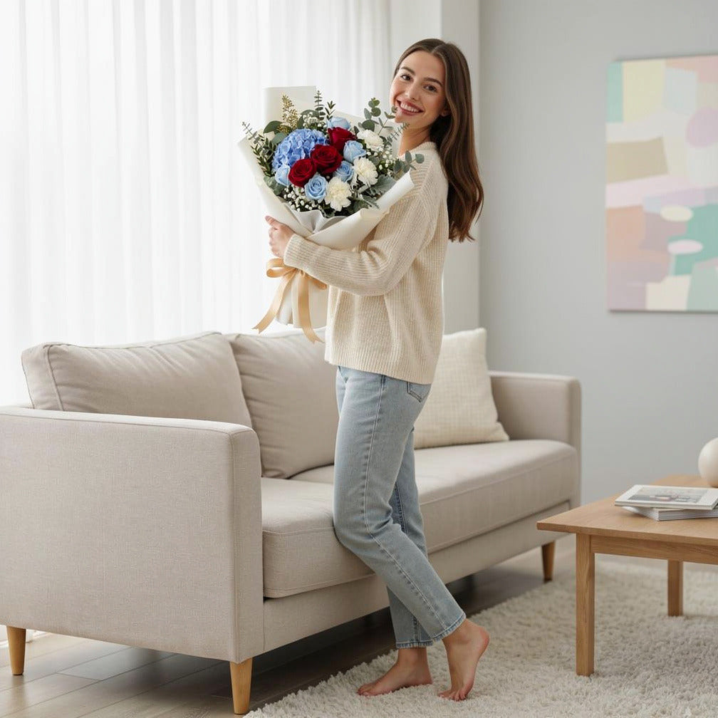 Father’s Day Blue & Red Roses Bouquet with Hydrangea held by a model, view 2