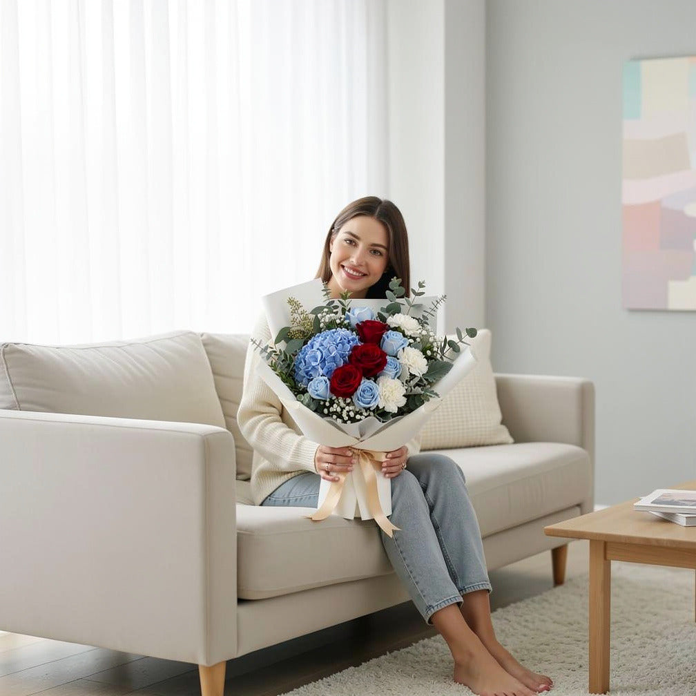 Father’s Day Blue & Red Roses Bouquet with Hydrangea held by a model, view 3