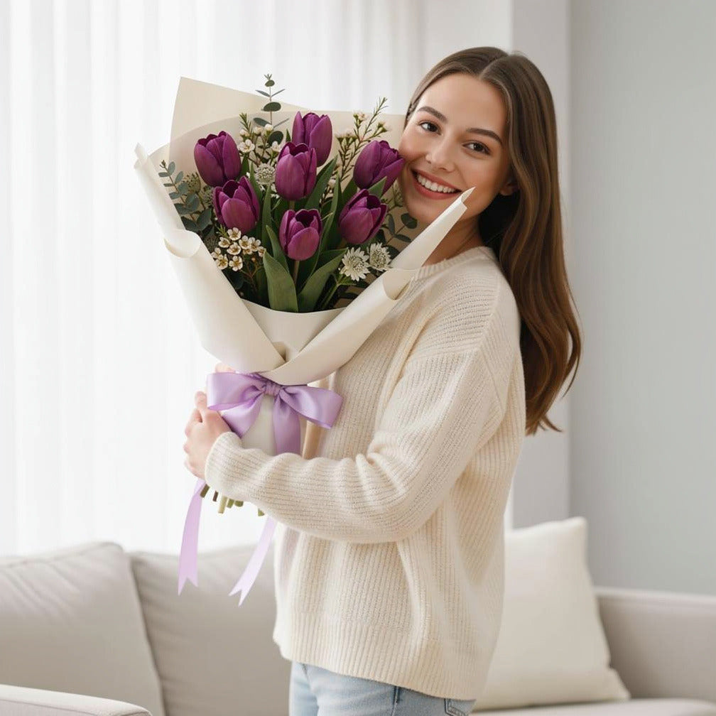 Father’s Day Bouquet of 7 Purple Tulips held by a model, view 1