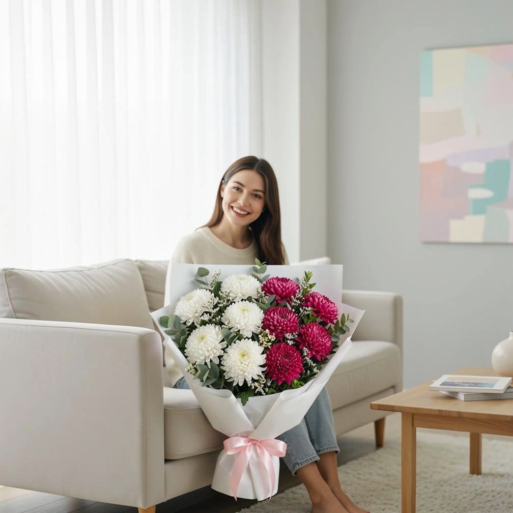 Mother’s Day Pink & White Chrysanthemum Bouquet held by a model, view 3