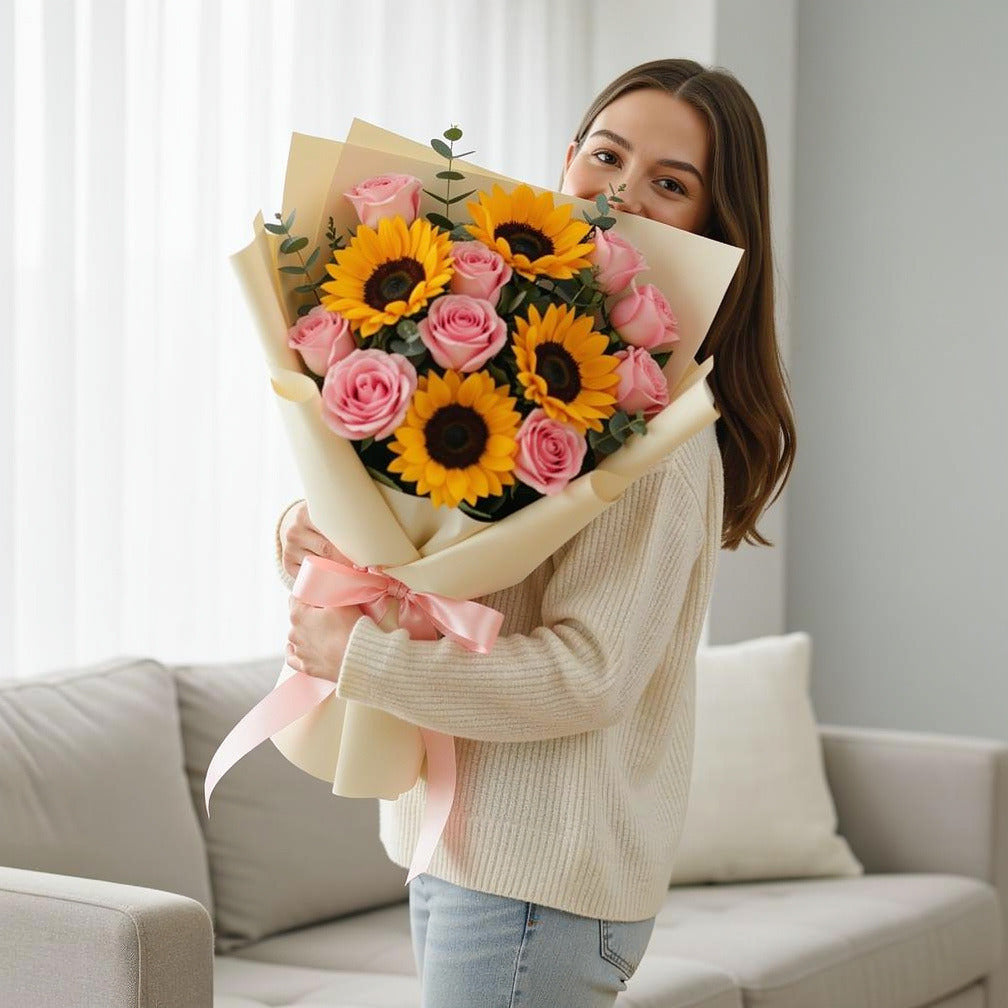 Mother’s Day Sunshine Pink Rose Bouquet held by a model, view 1