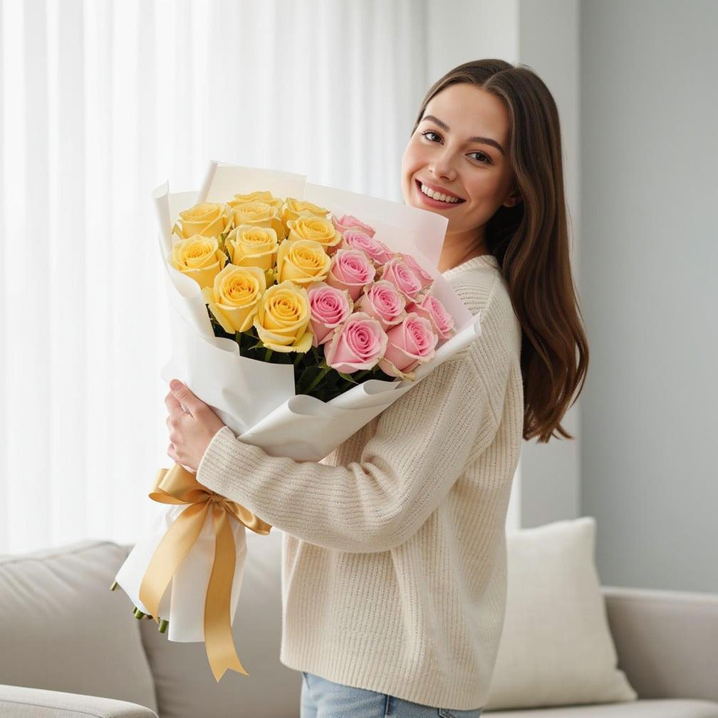 Pink & Yellow Roses Bouquet - Happiness Bouquet held by a model, view 1