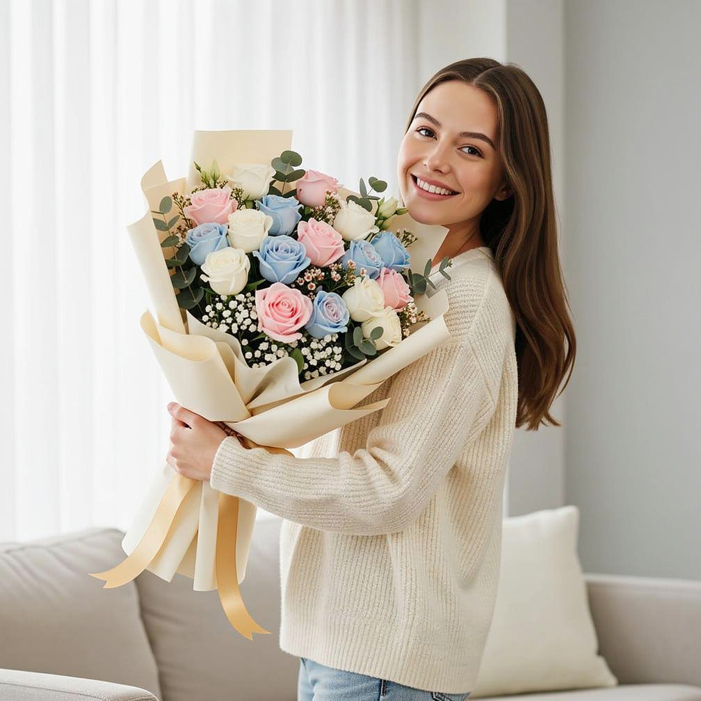 Premium Bouquet of 19 Pink, Blue & White Roses for Father’s Day held by a model, view 1