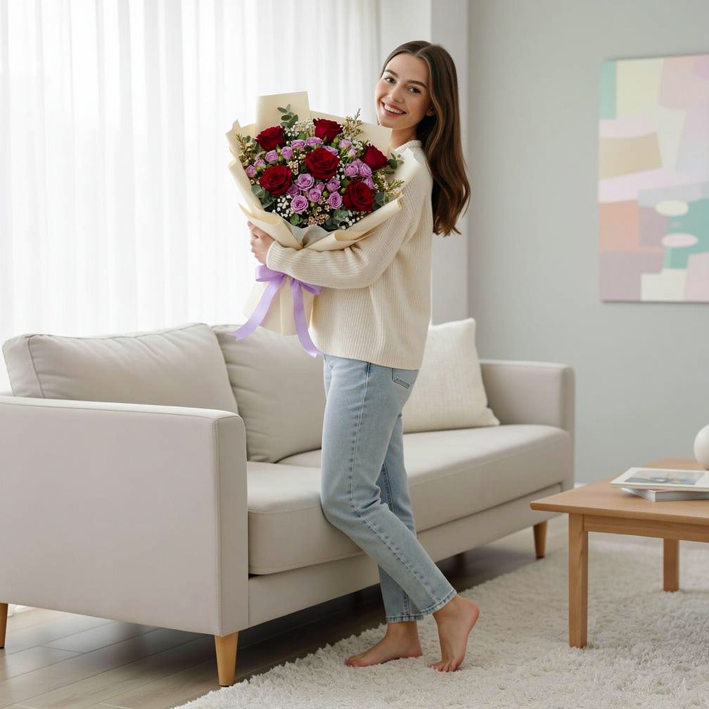 Romantic Red Rose & Purple Baby Rose Bouquet held by a model, view 2
