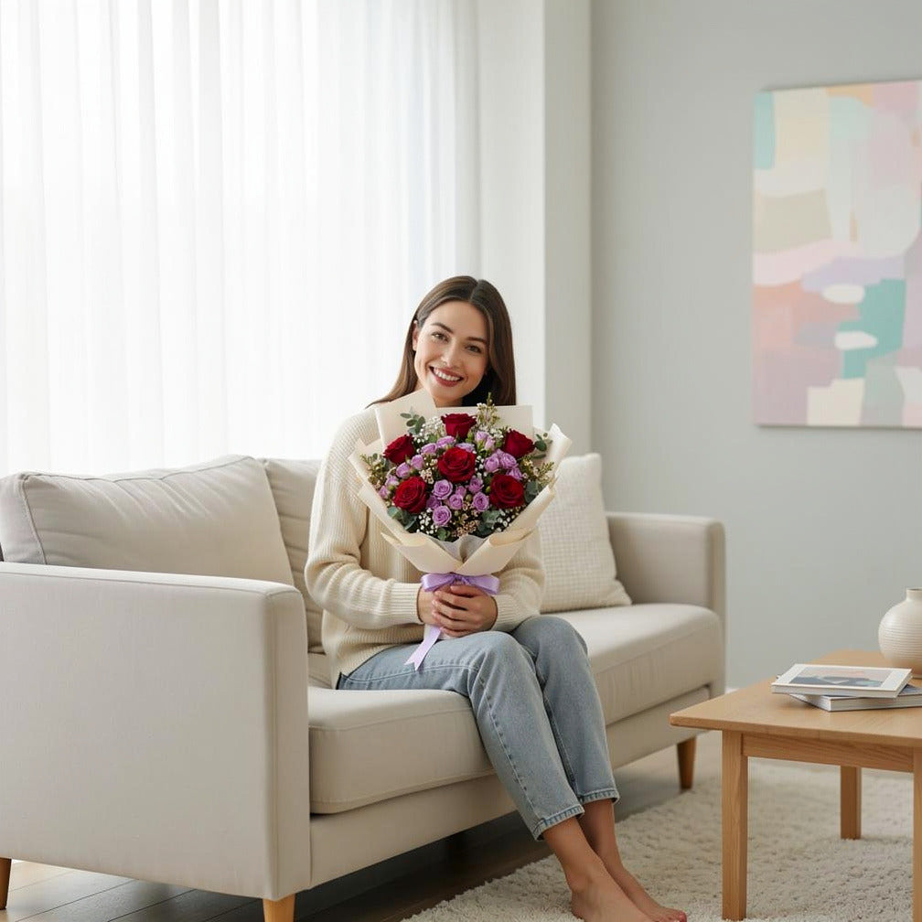 Romantic Red Rose & Purple Baby Rose Bouquet held by a model, view 3