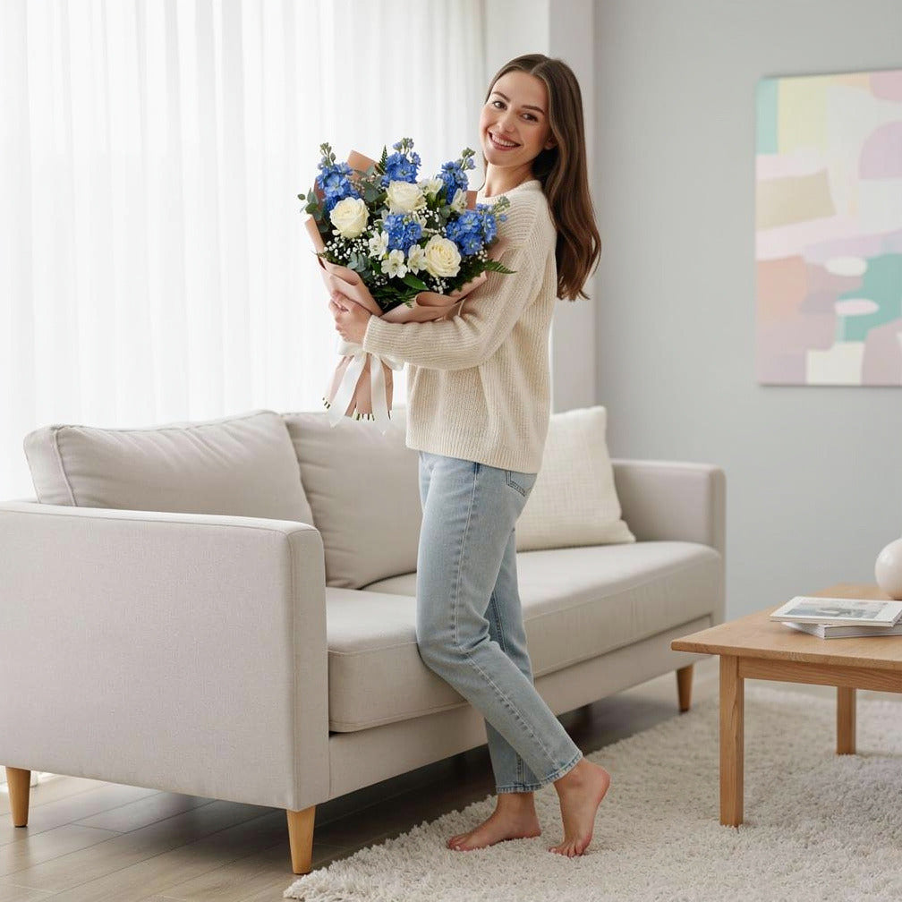 Serenity Bouquet of White Roses, Matthiola & Alstroemeria held by a model, view 2
