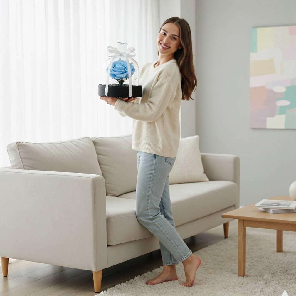 Sky Blue Small Preserved Rose held by a model, view 2