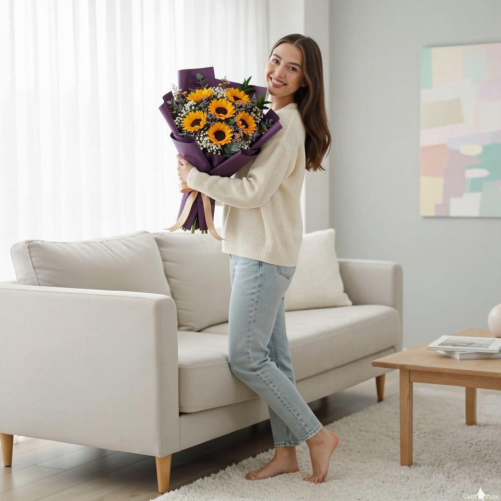 Sunshine Eid Bouquet of 6 Sunflowers held by a model, view 2