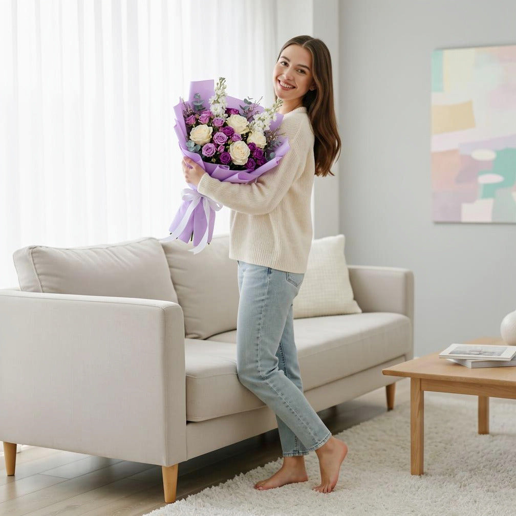 Teacher’s Day Elegant White & Purple Floral Bouquet held by a model, view 2