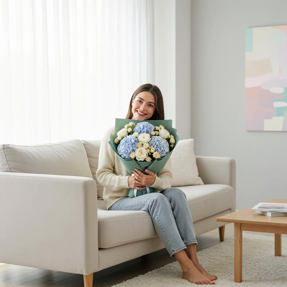 Teacher’s Day Ocean Breeze Hydrangea & Rose Bouquet held by a model, view 3