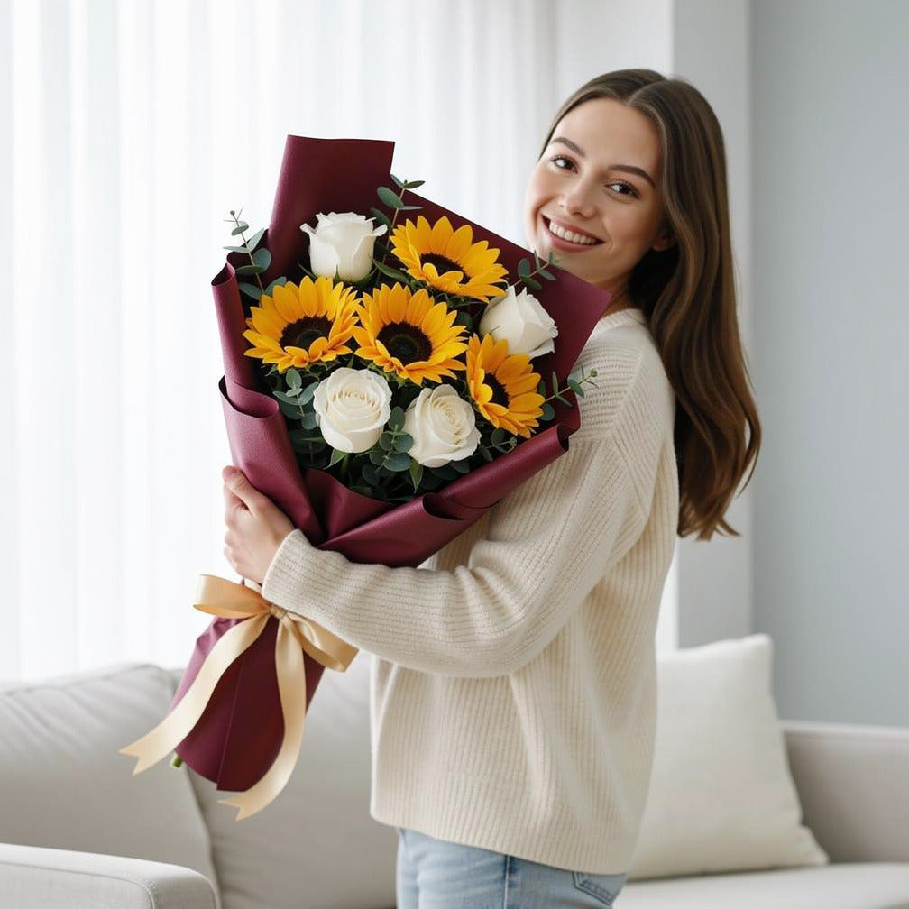 Teacher’s Day Sunflower & White Rose Mixed Bouquet held by a model, view 1