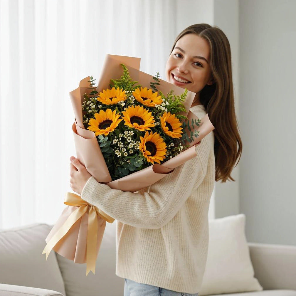 Teacher’s Day Sunshine Sunflower Bouquet held by a model, view 1