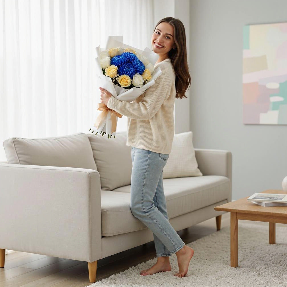 Teacher’s Day White & Yellow Rose with Blue Chrysanthemum Bouquet held by a model, view 2