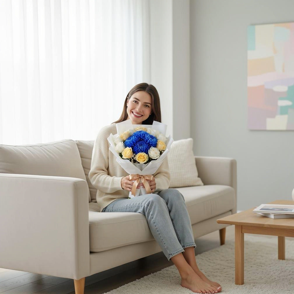 Teacher’s Day White & Yellow Rose with Blue Chrysanthemum Bouquet held by a model, view 3