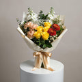 Vibrant Yellow Rose & Peach Carnation Bouquet