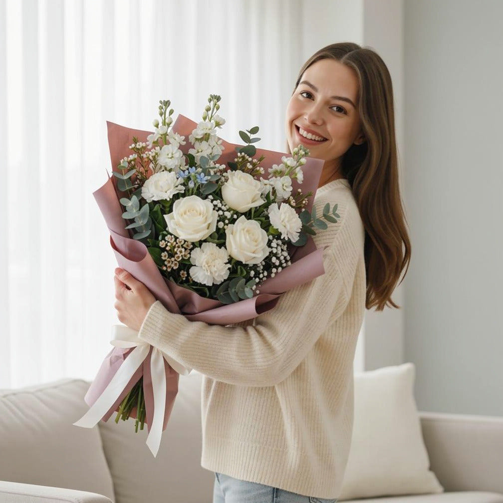 White Bouquet of Roses, Carnations & Matthiola for Father’s Day held by a model, view 1