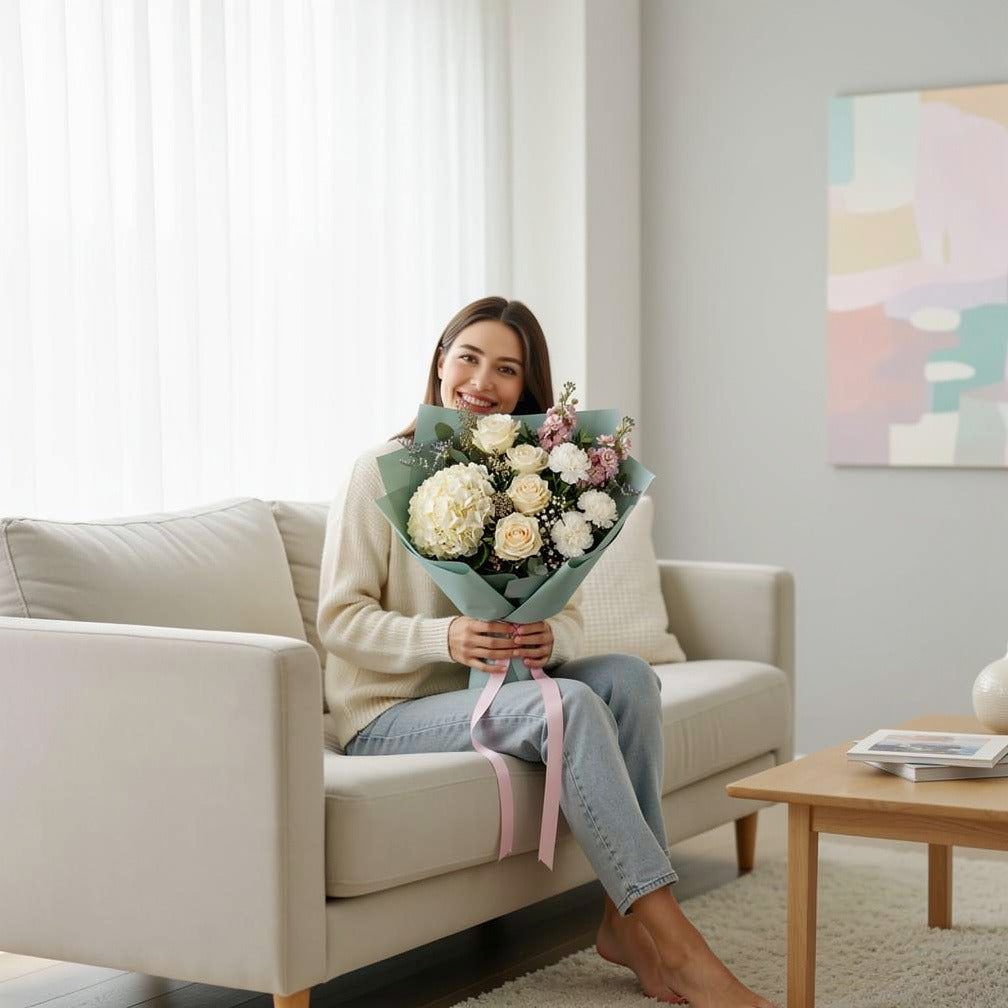 Women’s Day Ivory & White Elegant Hydrangea Bouquet held by a model, view 3