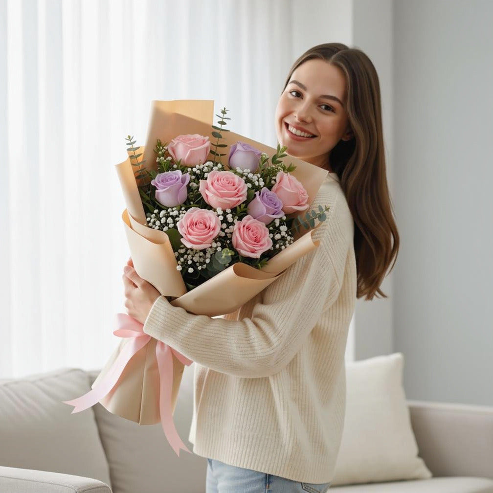 Women’s Day Pink & Purple Rose Elegance Bouquet held by a model, view 1