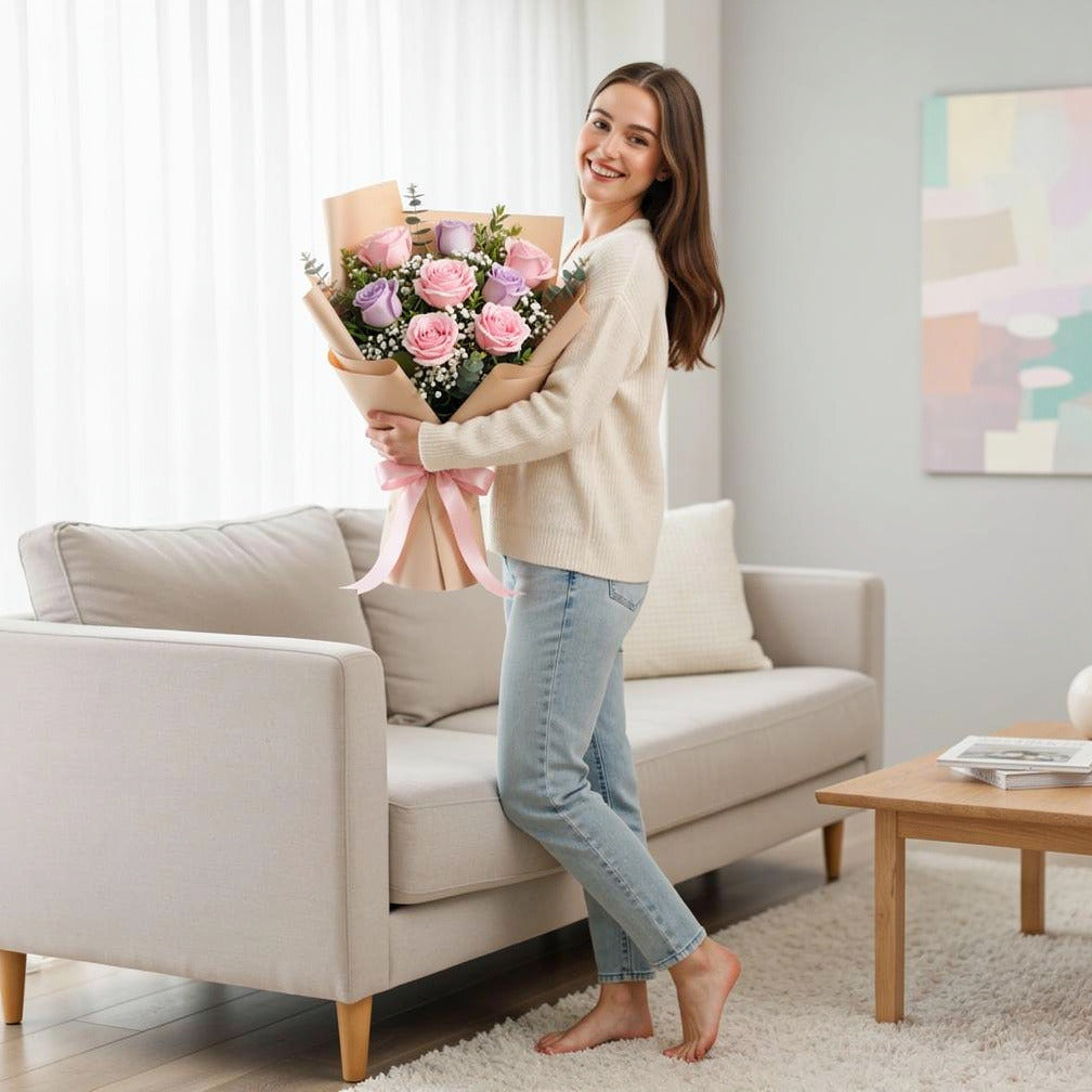 Women’s Day Pink & Purple Rose Elegance Bouquet held by a model, view 2